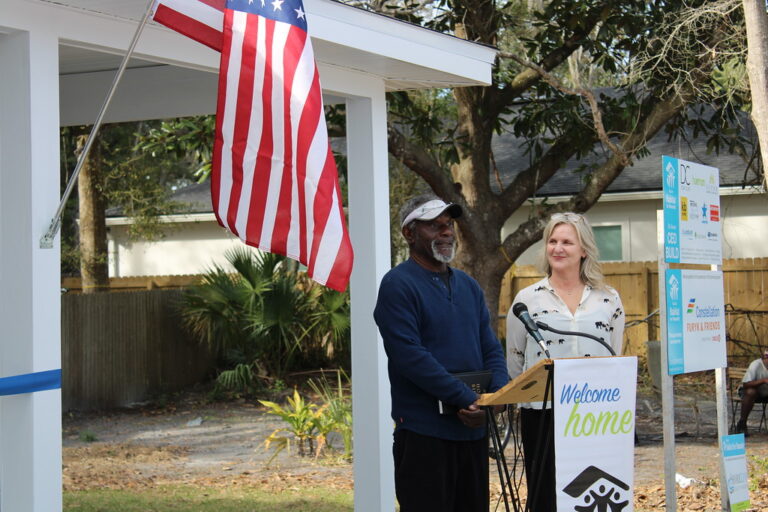 Randy making a speech at the celebration of his new home