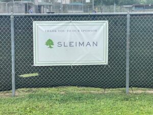 sleiman sign on fence