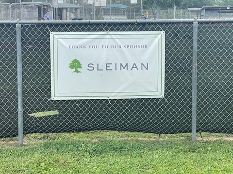 sleiman sign on fence