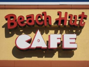 beach hut cafe exterior signage