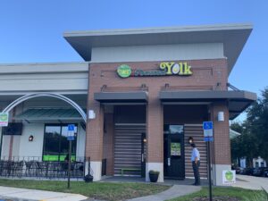 image of exterior of toasted yolk cafe